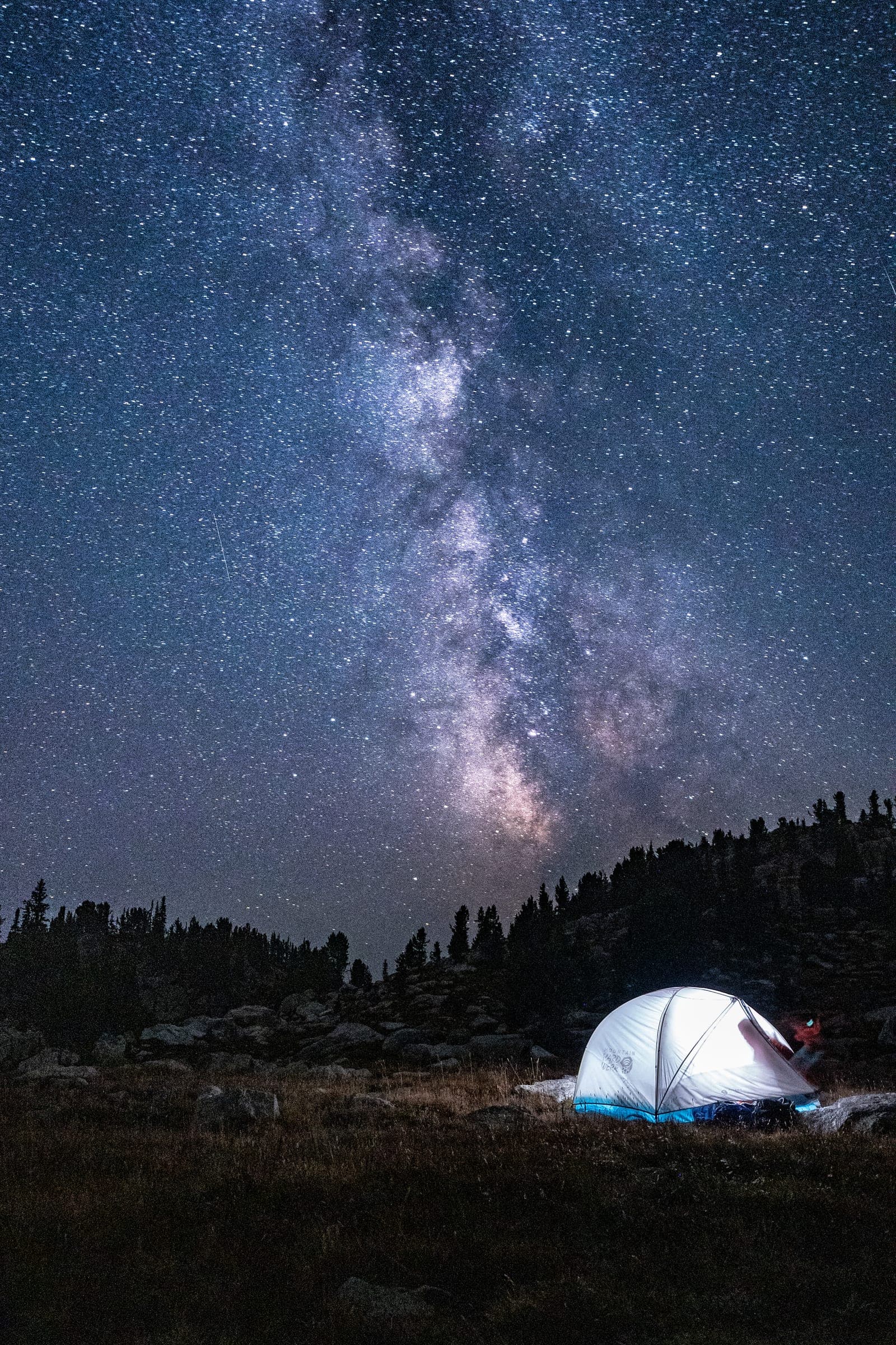 Milky Way core above a glowing tent